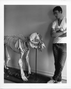 David Wojnarowicz with baby elephant skeleton. Photo by Peter Bellamy