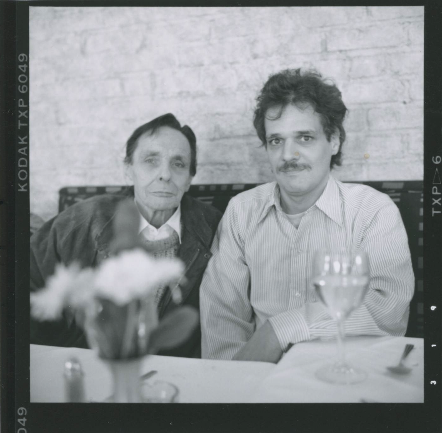 Herbert Huncke and Louis Cartwright, at Indian restaurant banquet for Hanuman Press, November, 1989 Photograph by Allen Ginsberg, (c) The Estate of Allen Ginsberg