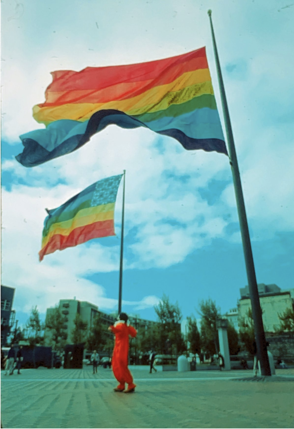 The two original eight-color rainbow flags designed by Gilbert Baker flying at United Nations Plaza during San Francisco Gay Freedom Day 1978. Photograph by Mark Rennie, courtesy the Gilbert Baker Foundation.