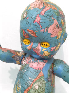 EVOLUTION, 1985, Mixed media on plastic doll, 17.5 x 13 x 5 inches