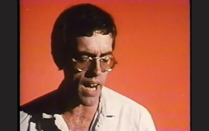 Still of David Wojnarowicz in AIDS Trilogie: Silence = Death, 1989, created by Rosa von Praunheim in collaboration with Phil Zwickler. Courtesy The Phil Zwickler Charitable and Memorial Foundation Trust.