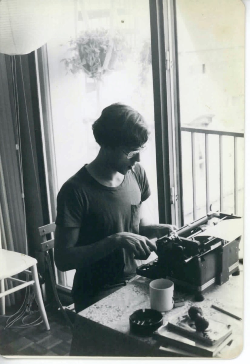 David typing at his sister Pat's home in France, 1979.